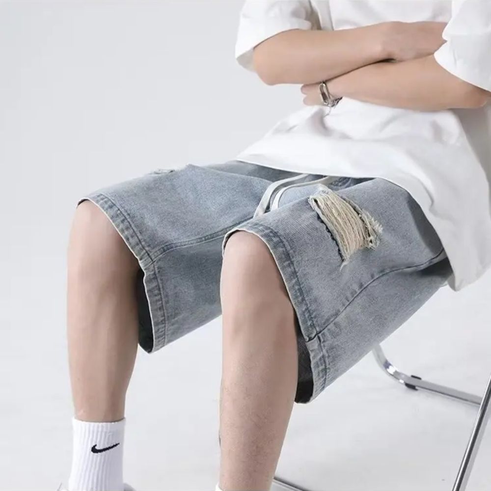 Summer Trend: Men's Light Blue Knee-Length Ripped Denim Shorts